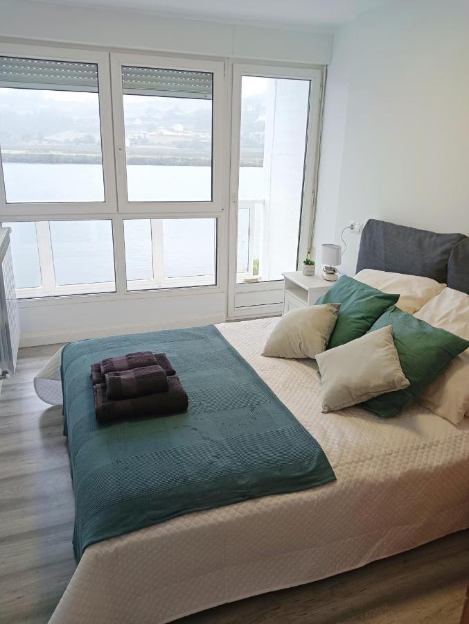Apartamento Ria Navia Bagian luar foto